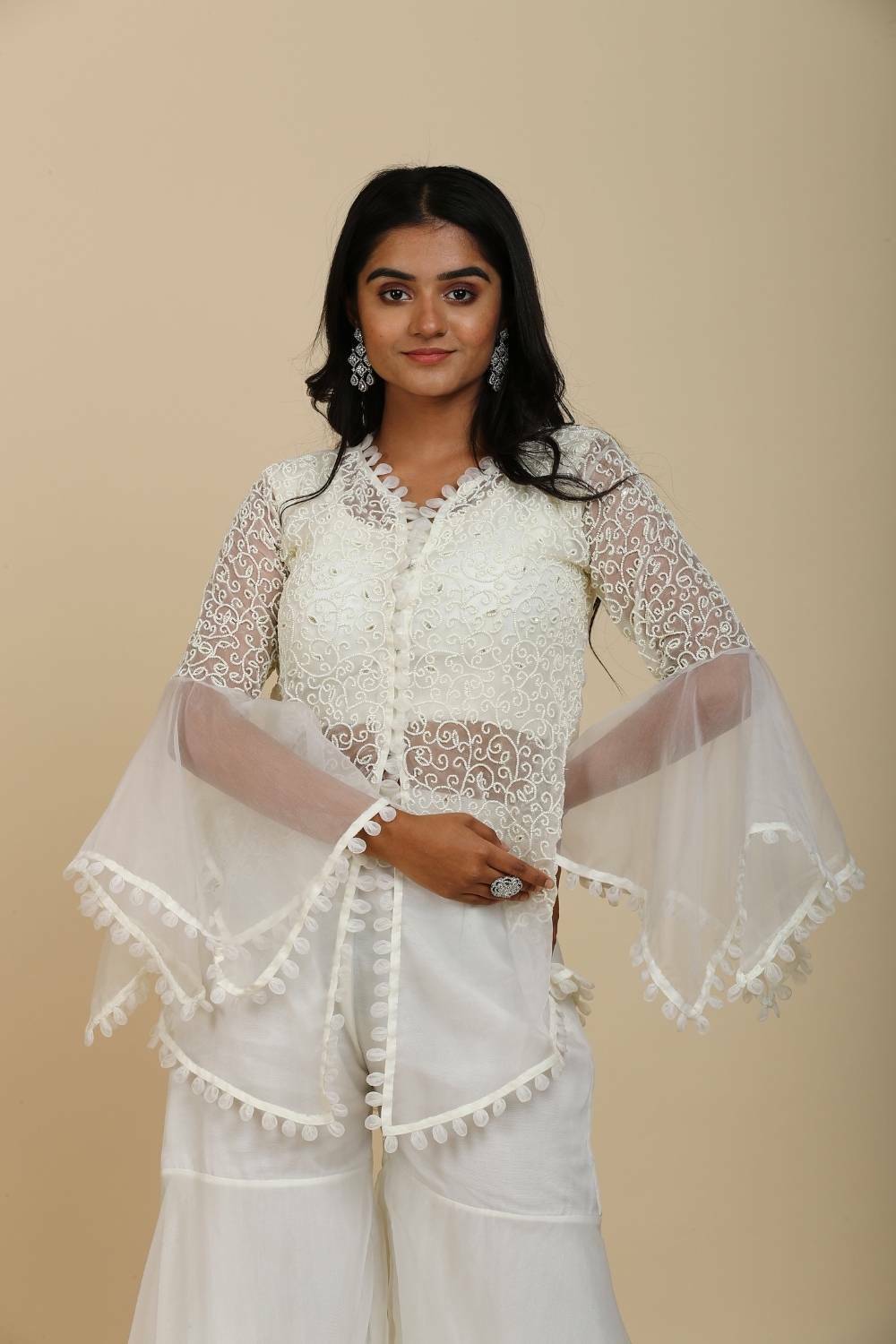 Off-white organza peplum top with moti jaal work